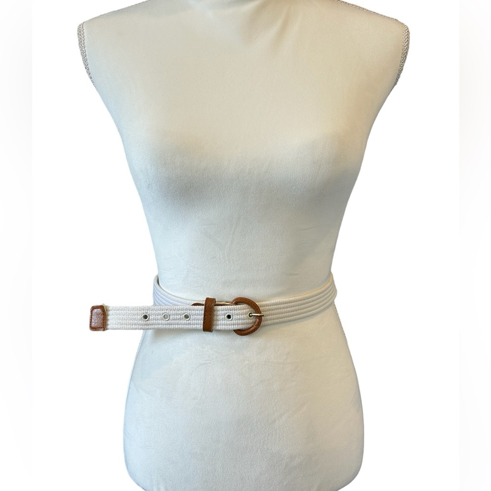 Women’s white & tan canvas belt. 43 1/2 inches long & width is 1 inch